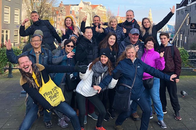 Absolutely Amsterdam - the Essential Introductory Walking Tour - Damrak to the Red Light District: faith and commerce in the same street