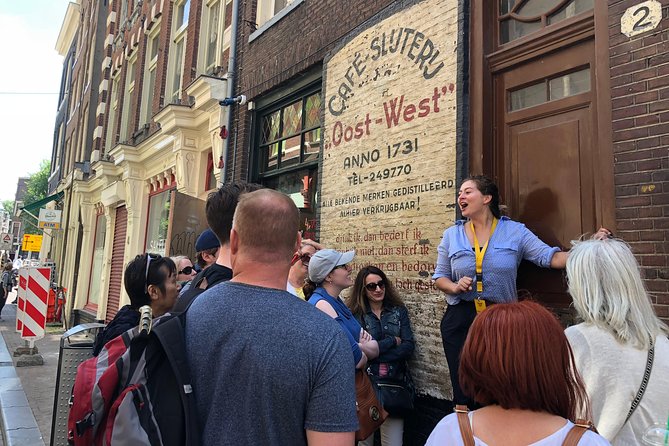 Absolutely Amsterdam - the Essential Introductory Walking Tour - Oostindisch Huis courtyard: Golden Age money, global trade, and the cost
