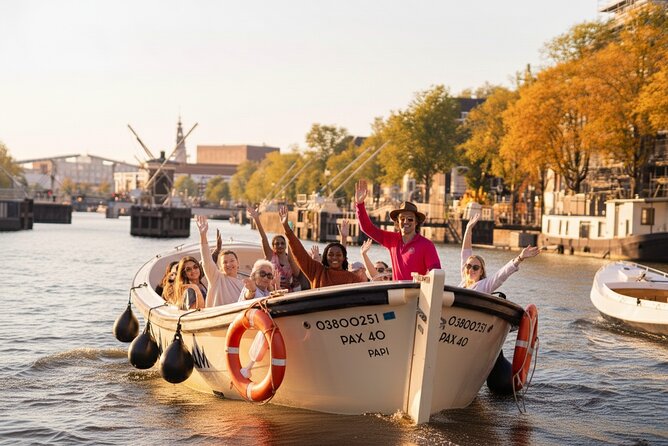 Amsterdam 1-Hour Canal Cruise With Live Guide - Skinny Bridge Romance and Amstel Big-City Energy