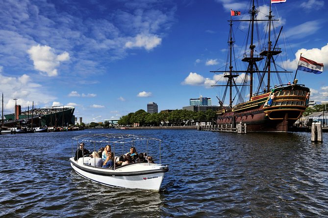 Amsterdam 2-hour Private Canal Cruise with Live Guide and Drinks - Stepping into Amsterdam from the canals