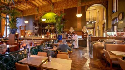 Amsterdam: 3-Course Meal in Historic 1st Class Waiting Rooms - Finding Grand Café Restaurant 1e Klas: Cuypers Hall staircase to platform 2B