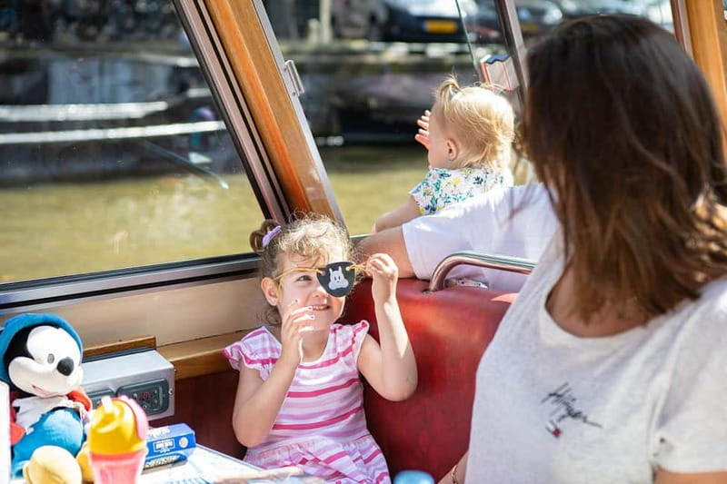 Amsterdam: 75 Minute City Canal Cruise with Audio Guide - Not just sights: the kind of stories the audio adds