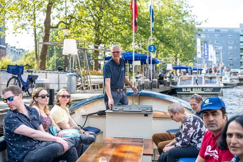 Amsterdam: 75 minute Open Boat Canal Cruise with Live Guide - Key things to know before you go