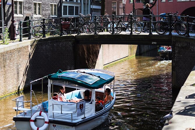 Amsterdam 90-min Private Canal Cruise with Live Guide and Drinks - Jordaan by Candlelight: A Quieter Amsterdam Side