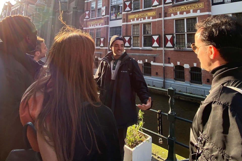 Amsterdam: Anne Frank Guided Small Group Walking Tour - Dam Square Photo Stop: From City Center to Occupation Reality