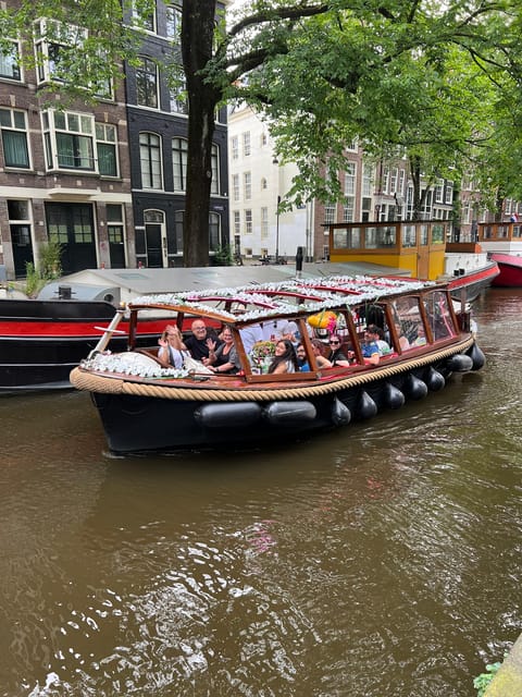 Amsterdam: Boat Tour with Optional Unlimited Drinks - The Enterprise boat: a compact canal tour that feels like a night out