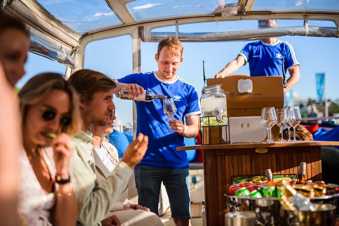 Amsterdam: Canal Booze Cruise with Unlimited Drinks Option - Boat comfort, small-group energy, and the guides who set the tone