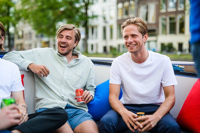 Amsterdam: Canal Booze Cruise with Unlimited Drinks Option - Rain plan: covered boats, wet seats, and what to bring