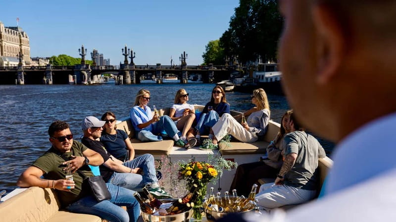Amsterdam: Canal Cruise in Open Boat with Drink Option - Key highlights worth your attention