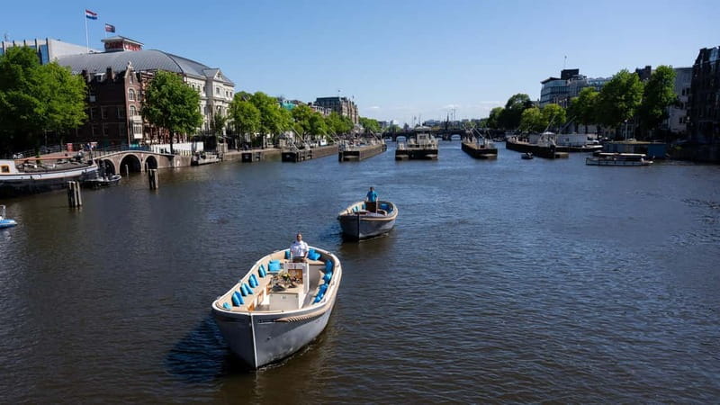 Amsterdam: Canal Cruise in Open Boat with Drink Option - The one-hour route: what you’ll see at each main stop