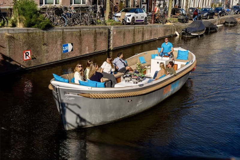 Amsterdam: Canal Cruise in Open Boat with Drink Option - Drinks on board: small perk, big mood shift