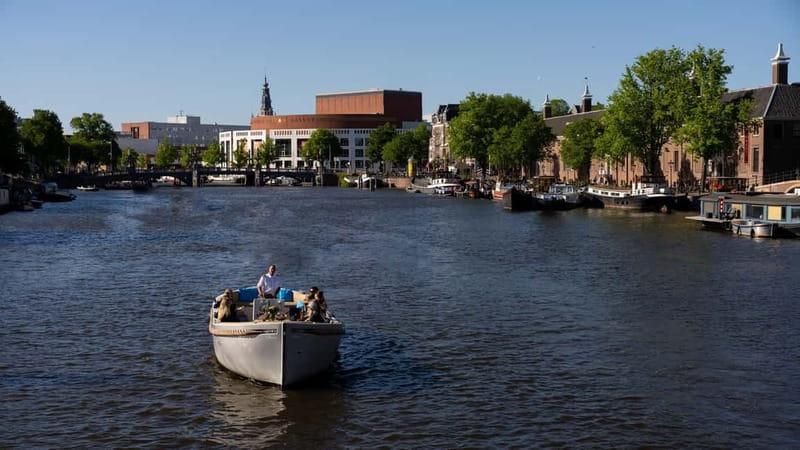 Amsterdam: Canal Cruise in Open Boat with Drink Option - Timing and prep: how to make the hour feel effortless