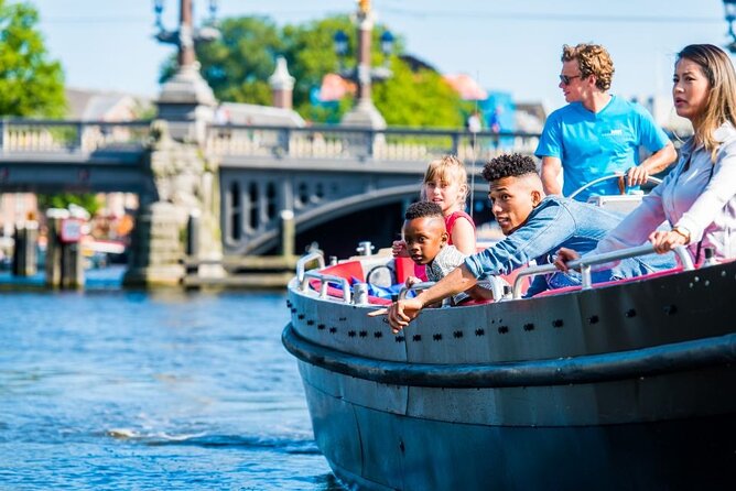 Amsterdam Canal Cruise in Open Boat with Unlimited Drinks Option - What you’ll actually see: UNESCO canals, photo stops, and the quieter bends