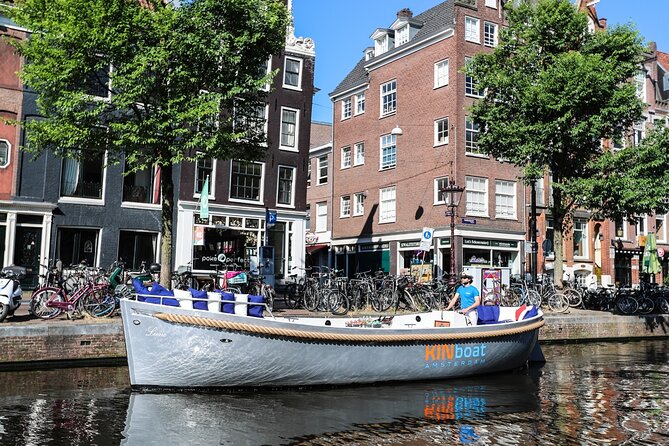 Amsterdam Canal Cruise in Open Boat with Unlimited Drinks Option - Cruising past the Hermitage Museum: a landmark you can place later