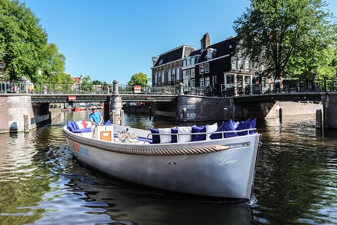 Amsterdam Canal Cruise in Open Boat with Unlimited Drinks Option - Best times to go: sunset lights, fewer crowds, and a cozy ride