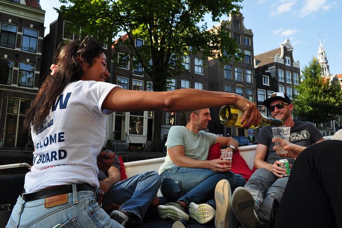 Amsterdam Canal Cruise With Live Guide and Unlimited Drinks - Entering the flow: where you meet and what timing feels like