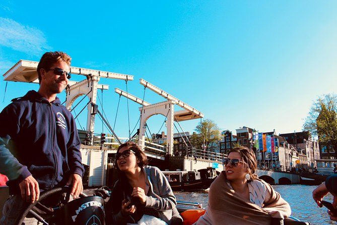 Amsterdam Canal Tour by Open Boat – 90 min Small Group Experience - Meeting at Nieuwe Keizersgracht: what to wear and expect