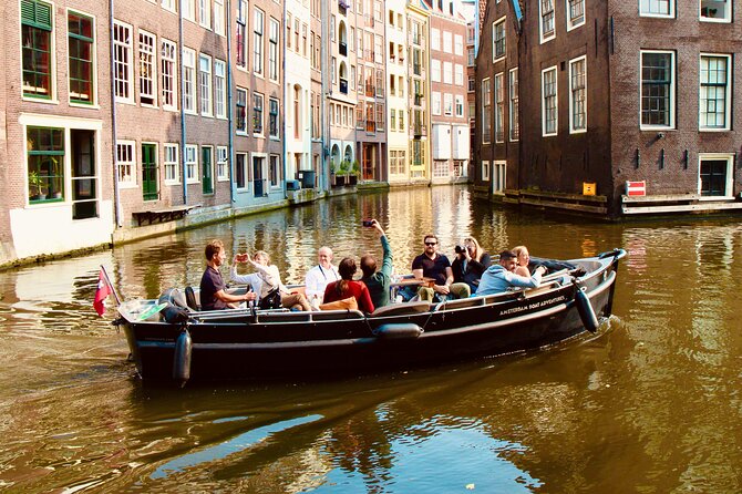 Amsterdam Canal Tour by Open Boat – 90 min Small Group Experience - Nieuwmarkt to de Waag: the city gate turned museum-and-more building