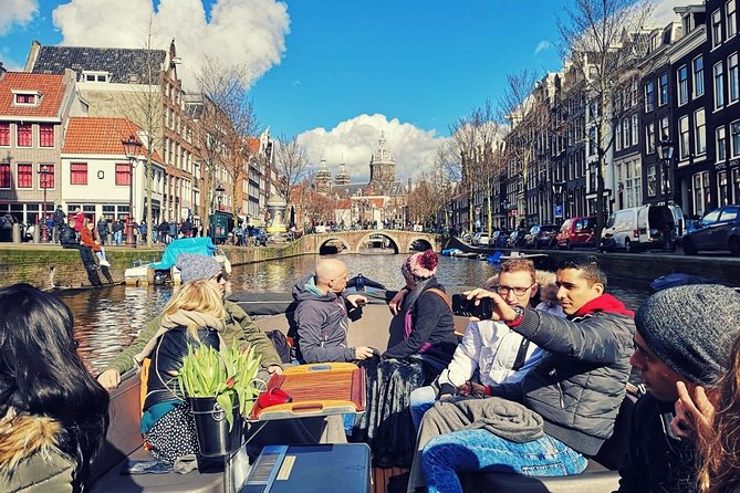 Amsterdam Canal Tour by Open Boat – 90 min Small Group Experience - Tiny canals, medieval defense, and the V.O.C. ship The Amsterdam