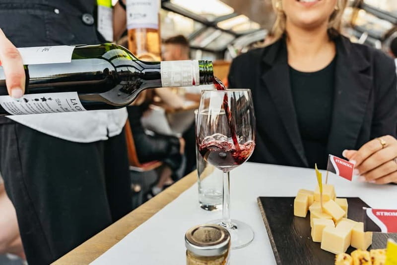 Amsterdam: Cheese & Wine Cruise Tasting Experience - Getting on Board: Stromma at Damrak Pier 5