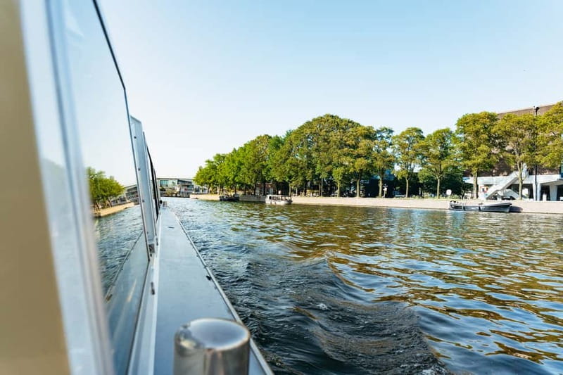 Amsterdam: City Centre Canal Cruise & Free Flower Cocktail - The Skinny Bridge, bridges in every direction, and why it matters