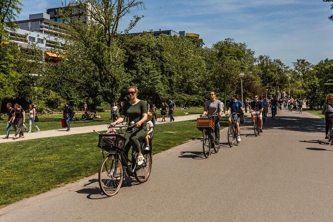 Amsterdam City Highlights and Hidden Gems - Private & Custom Tour - Central Square Life: Bookstores, Cafés, and Quiet Passageways