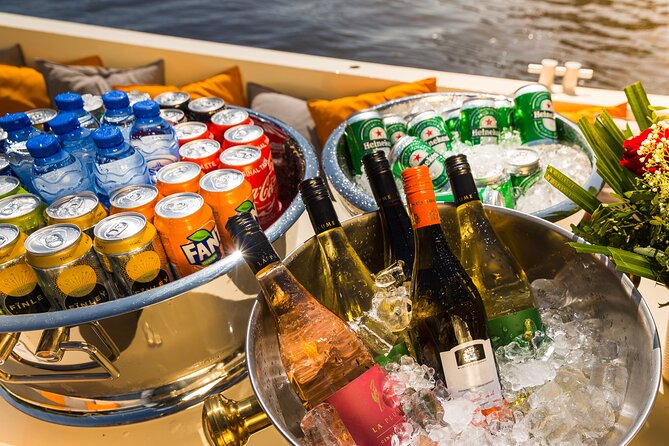 Amsterdam Classic Saloon Boat Canal Cruise with Live Guide - Amstel River Cruising: The City’s Lifeline, Not Just a Pretty Backdrop