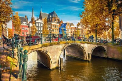 Amsterdam Classic Saloon Boat Cruise with Drinks and Cheese - Covered Wooden Boat vs. Open-Air: How the Experience Changes