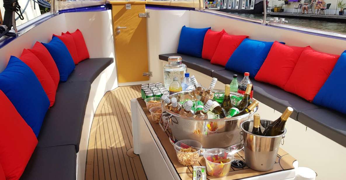 Amsterdam: Covered Canal Booze Cruise with Unlimited Drinks - Stop-by-stop: from Red Light District canals to the Seven Bridges viewpoint
