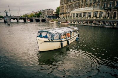 Amsterdam: Covered Canal Booze Cruise with Unlimited Drinks - The 1-hour route: what you’ll see and how it flows