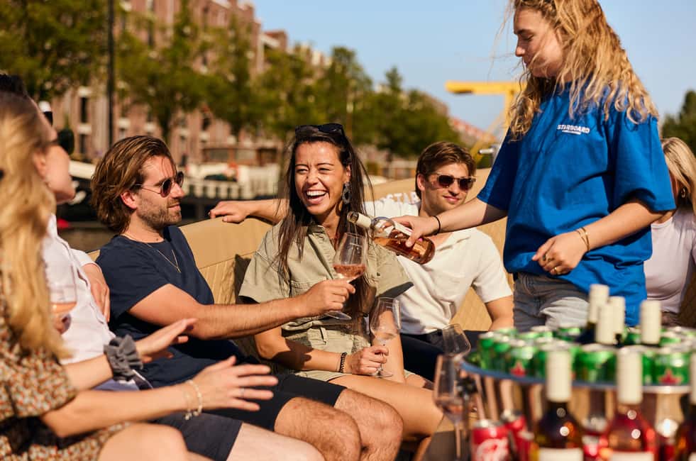 Amsterdam: Cozy Evening Canal Cruise With Open Bar Option - Amsterdam Canal Cruise in 1 Hour: a simple first-night win