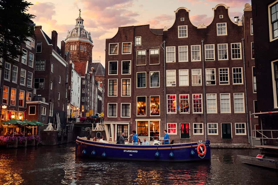 Amsterdam: Cozy Evening Canal Cruise With Open Bar Option - Golden Age canals + a partly covered boat: what “cozy” really means
