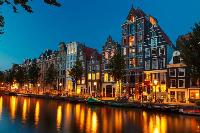Amsterdam Evening Canal Cruise with Live Guide and Onboard Bar - Carré and opera stops: Amsterdam’s culture you can spot instantly