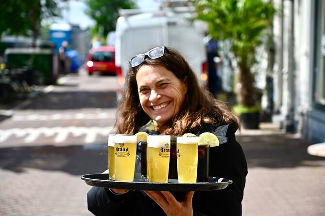 Amsterdam Food Tour of 10+ Local Classic Tastings in Jordaan Area - Jordaan Alleyways and Canal Views You’ll Walk Through