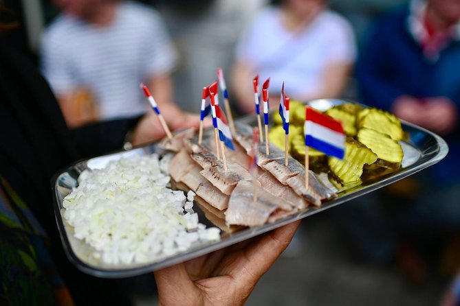 Amsterdam Food Tour of 10+ Local Classic Tastings in Jordaan Area - The Taste Lineup: Poffertjes, Cheese, Fish, and Dutch Comfort Food