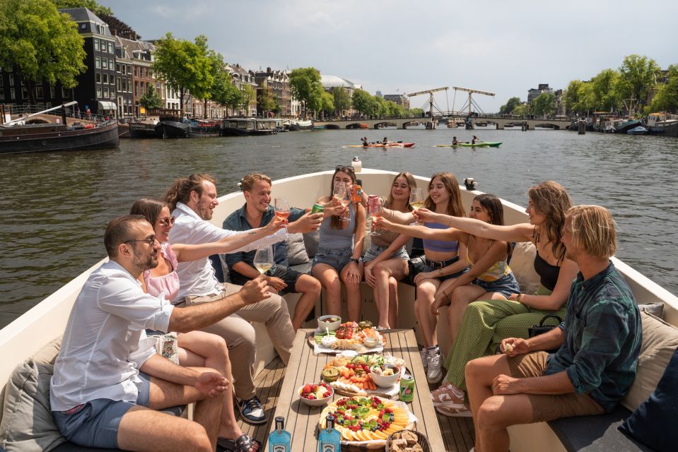 Amsterdam: German Guided Canal Cruise with on Board Bar - Your Boat Setup: Open or Closed, Quiet Motors, Drinks Onboard