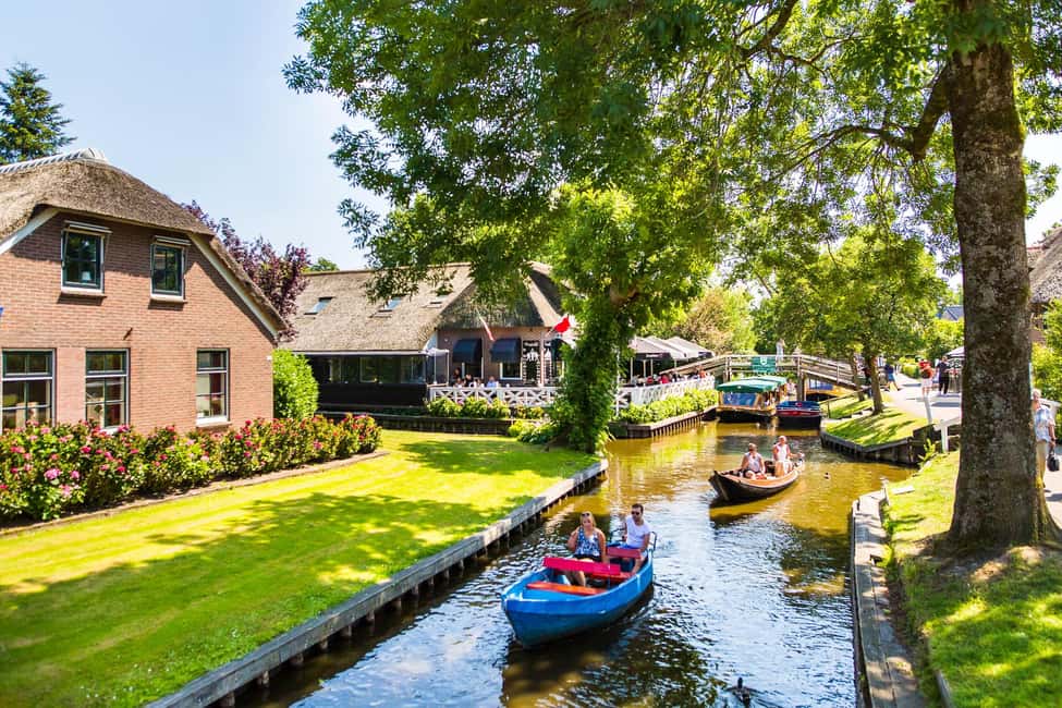 Amsterdam: Giethoorn Day Trip with Boat Tour - Giethoorn on Foot: Canals, Bridges, and Car-Free Calm