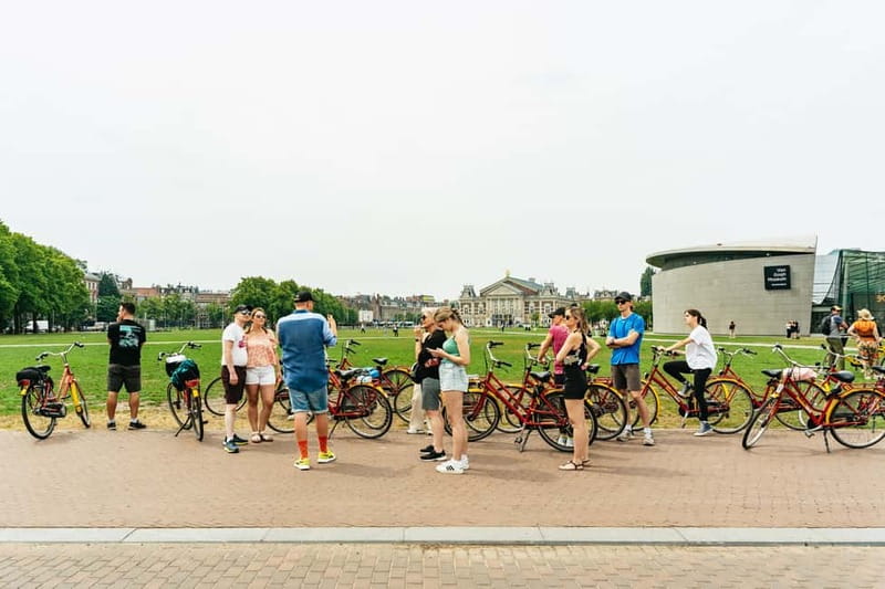 Amsterdam: Guided Bike Tour City Centre in EN/DE/FR/ES - Key highlights you should care about
