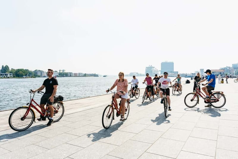 Amsterdam: Guided Bike Tour City Centre in EN/DE/FR/ES - Leidseplein energy, street performance zones, then Vondelpark reset