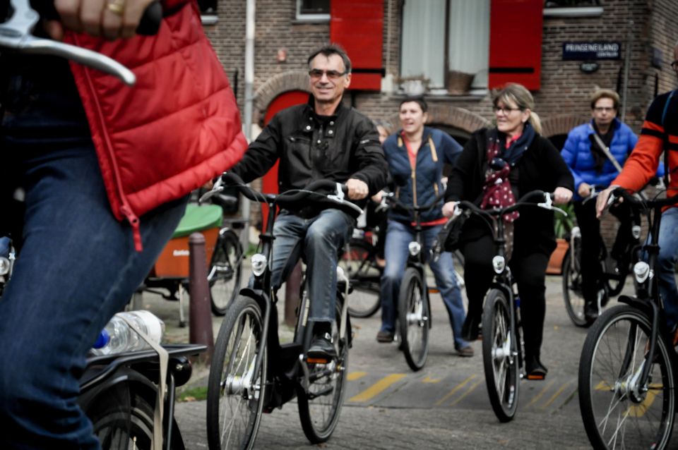Amsterdam: Guided City Bike Tour in French - Key things to know before you pedal