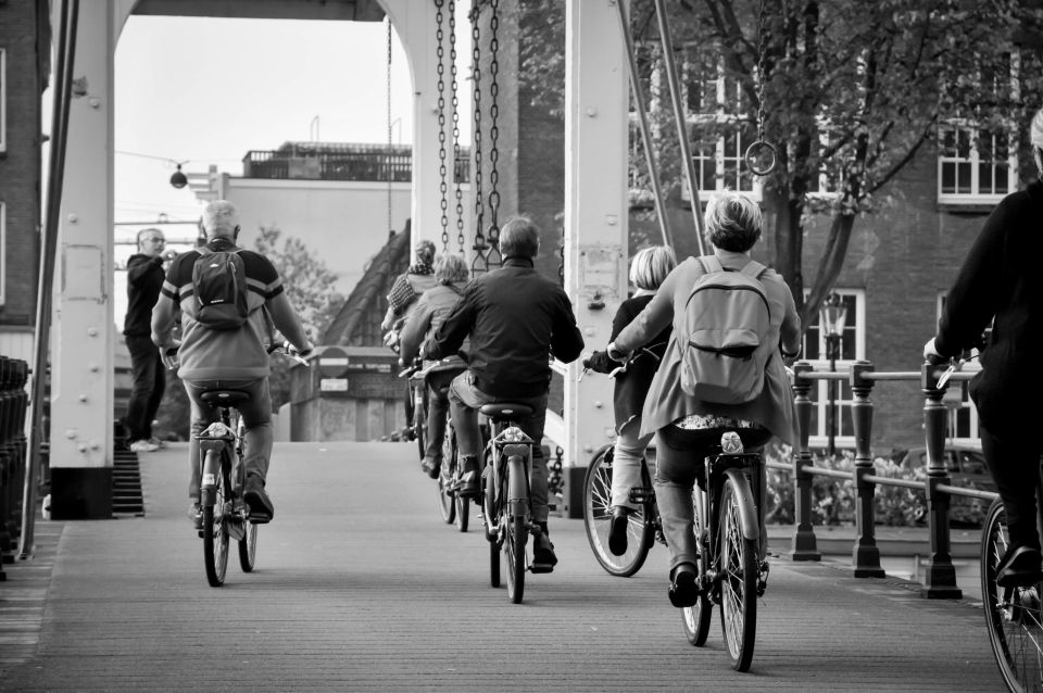 Amsterdam: Guided City Bike Tour in French - Western Islands to De Negen Straatjes: warming up the ride