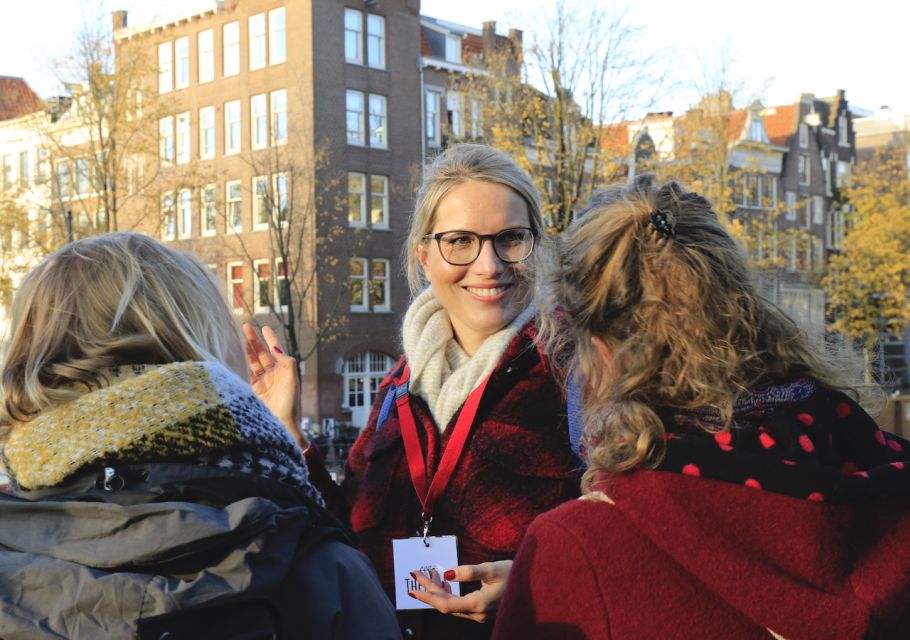 Amsterdam: Guided Cultural Walking Tour - Crossing Back to Dam Square Along the Amstel