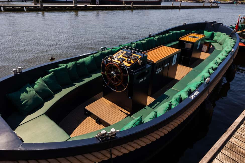 Amsterdam: Guided Open Boat Canal Cruise Including Drink - How the guide talk works on the water