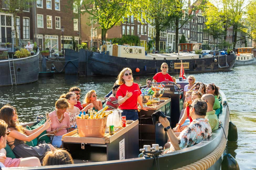 Amsterdam: Guided Open Boat Canal Cruise Including Drink - Who this Amsterdam canal cruise fits best