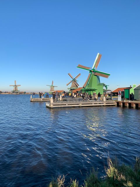 Amsterdam: Guided Zaanse Schans, Windmills & Cheese Tour - Zaanse Schans wandering time: shops, views, and optional upgrades