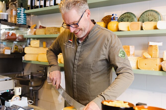 Amsterdam High-End Dutch Food & History Tour - Up to 8 guests - Cheese, sausage, and fish: what each stop teaches you