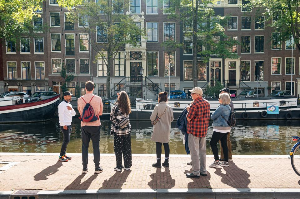 Amsterdam: Highlights & History Walking Tour - Guide Quality Makes or Breaks a Short Tour