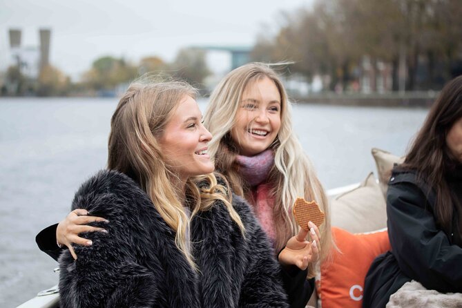 Amsterdam: Luxury Saloon Boat Cruise with Cocktails & Waffle - Best time to go: day or night on the canals