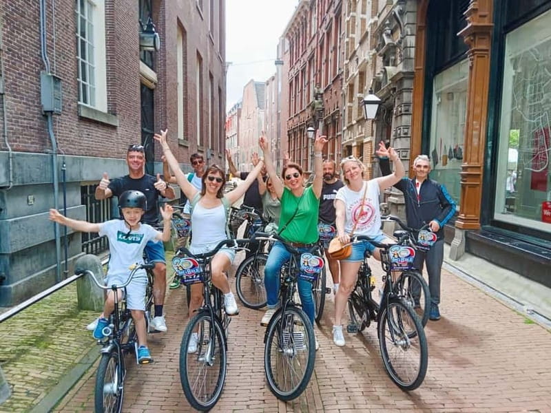 Amsterdam: Off the Beaten Path Bike Tour in French - Key highlights worth your attention
