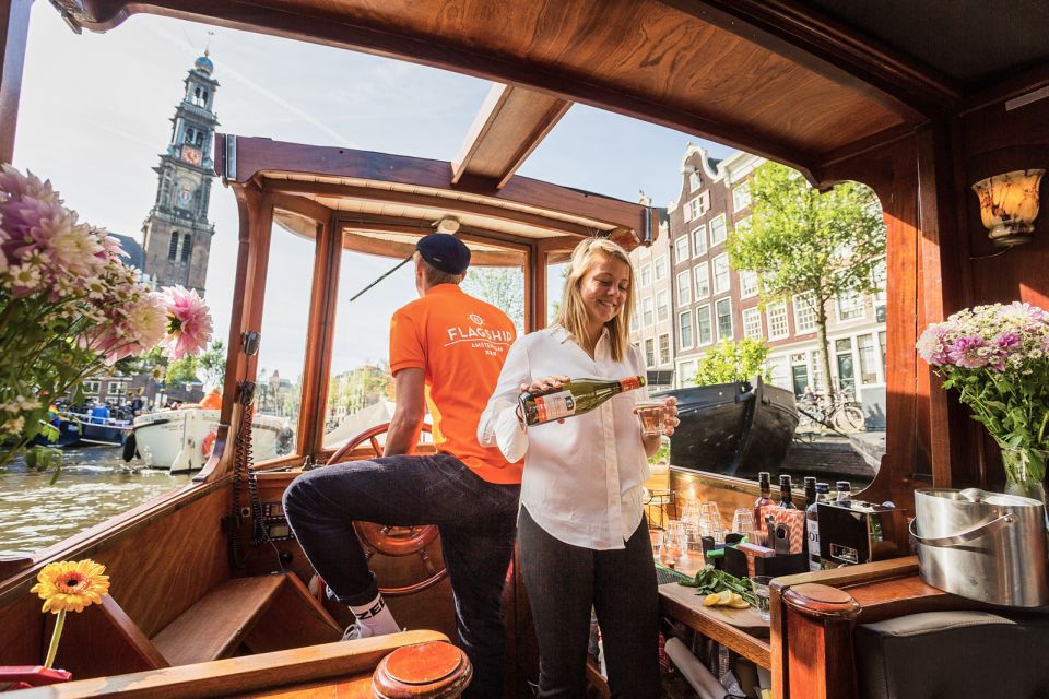 Amsterdam: Open Boat Cruise option Unlimited Drinks & Bite - The guide and skipper make (or break) the experience